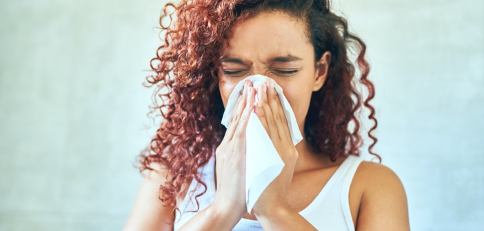 cold, flu, woman blowing nose