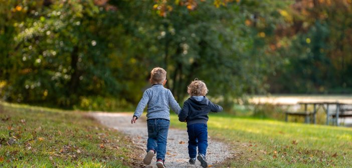 boys walking in the autumn