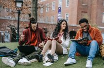 students at a library outside