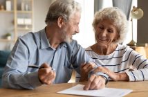 older couple with paperwork