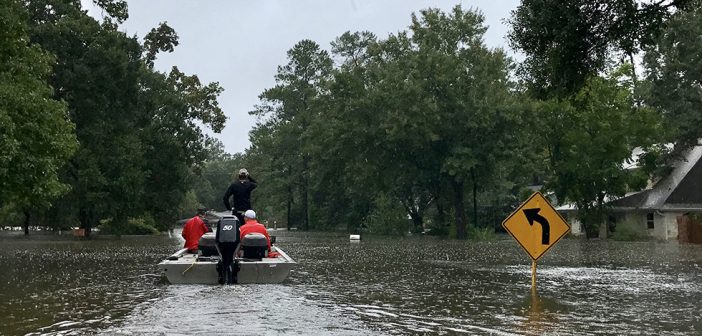 emergency, people in boat during floor