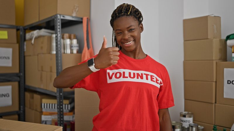 young woman volunteering in a donation warehouse