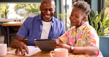 older couple with paperwork, finance