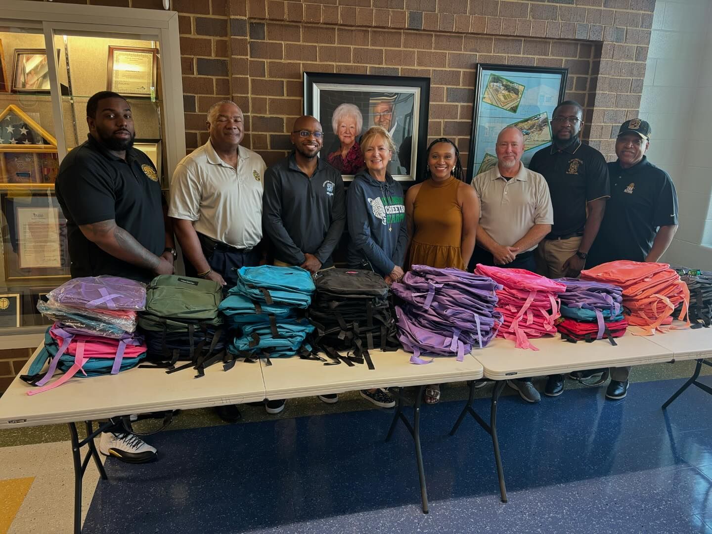 Alpha Phi Alpha with school supplies
