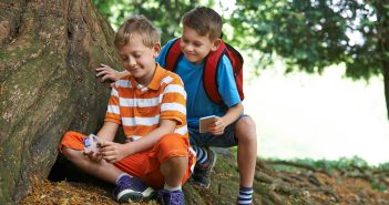 young boys geocaching