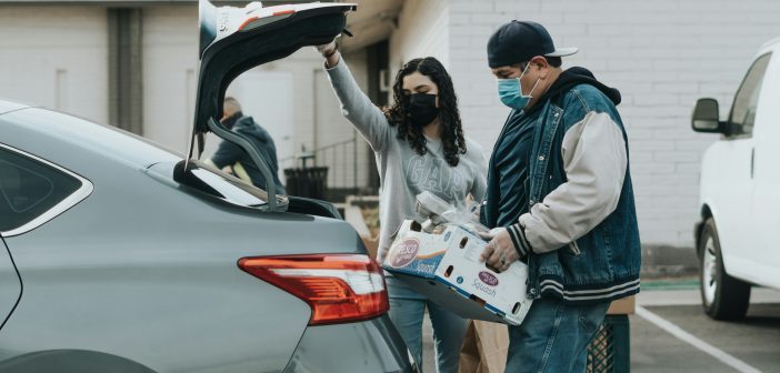 loading donated food into a car