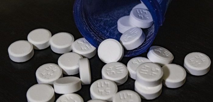pills spilling ot of a bottle