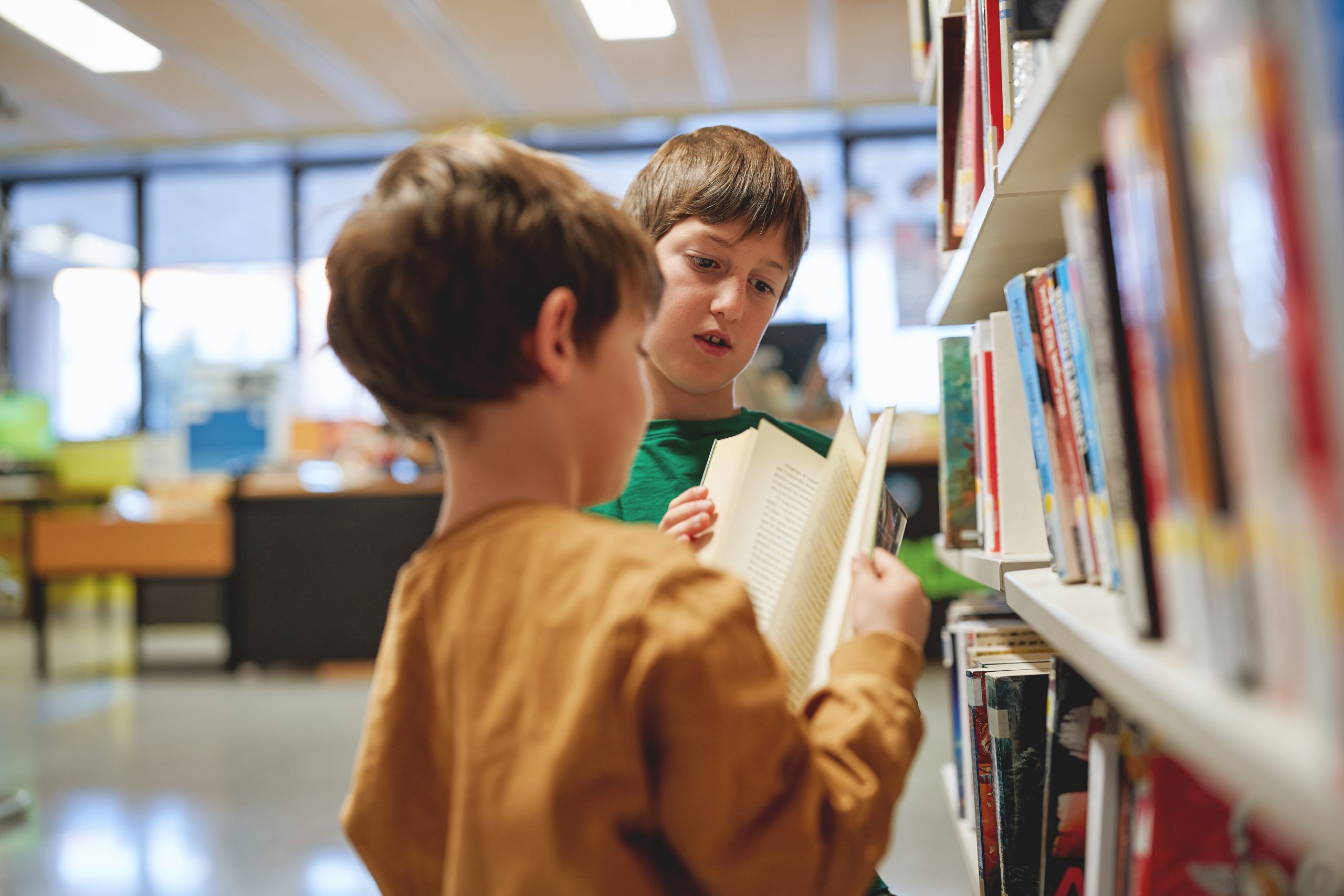 young boys in a library