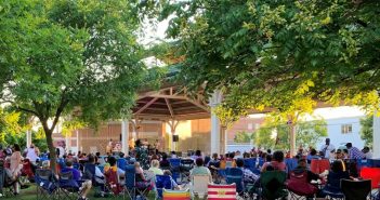 people listening to a concert at Harris Pavilion